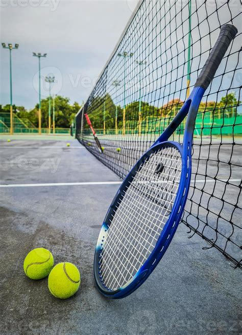Tennis racket and tennis balls on tennis hard court. 11046703 Stock ...