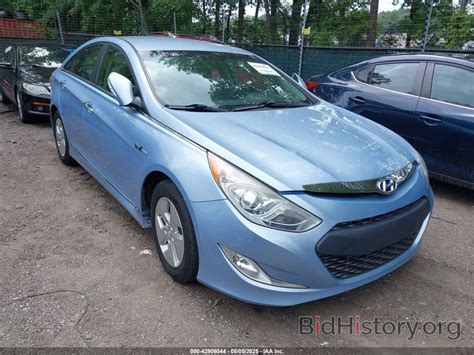 Report KMHEC4A48CA054307 HYUNDAI SONATA HYBRID 2012 Light Blue Hybrid - price and damage history