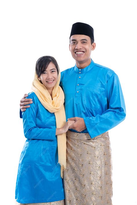 Muslim asian couple during hari raya eid mubarak over white background ...