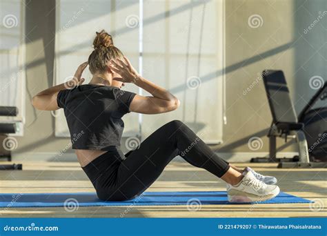 Girl in sports set slowly undresses and sits on the dick