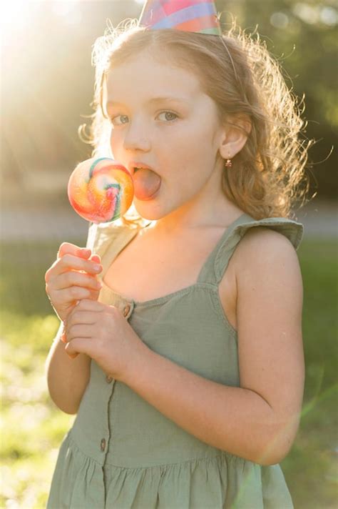 Smiling kid lollipop Images - Free Download on Freepik