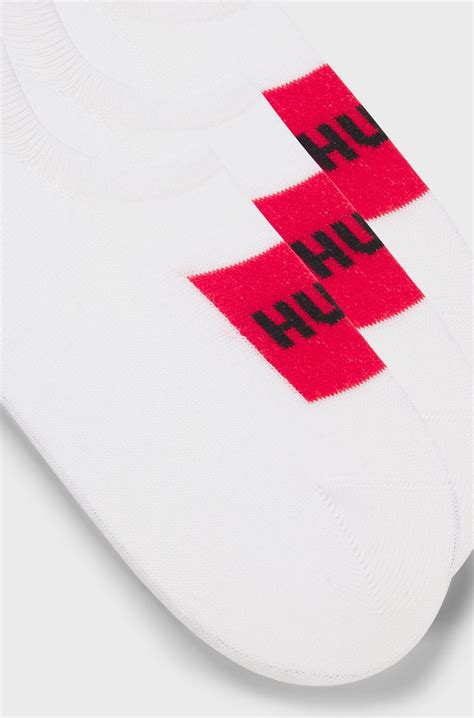 HUGO - Three-pack of invisible socks with red logo labels - White