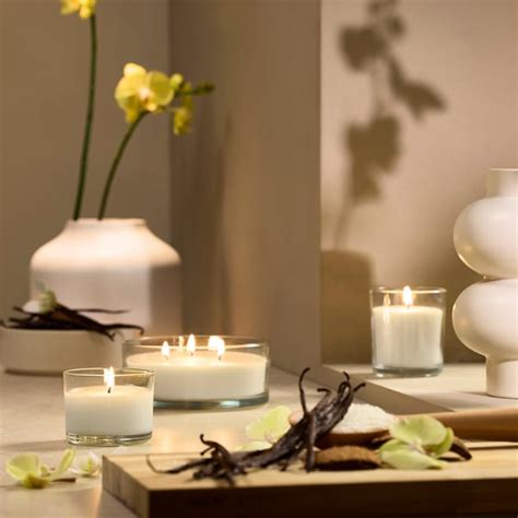 LOTSFÅGEL scented candle in glass, Vanilla pale beige, 20 hr - IKEA