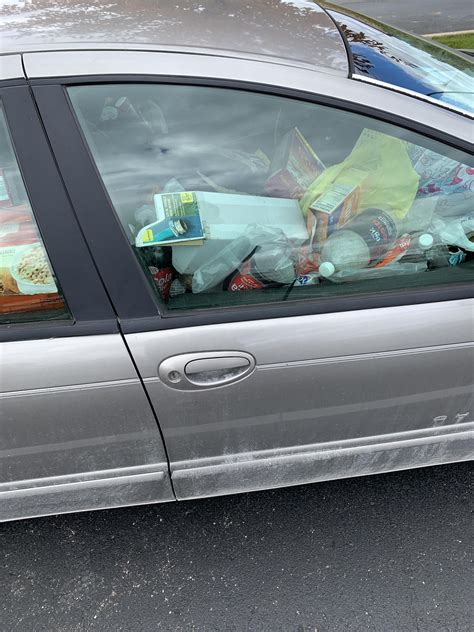 this car has been in the library parking lot for like two weeks now and ...