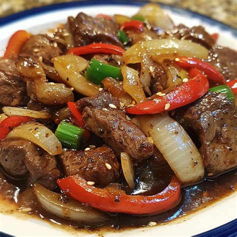 Sizzling Chinese Pepper Steak with Onions - Naneg Recipes.