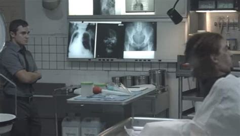 Spooky morgue video: Man rises from dead as people walks into the room ...