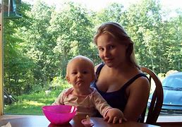 Image result for Caring Mother and Baby