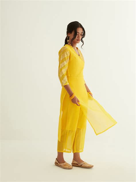 Overlapped neckline chanderi kurta highlighted with Gota Patti