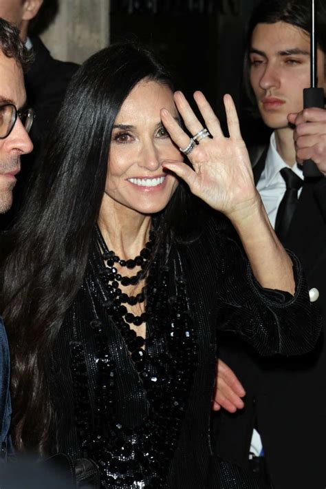 Demi Moore and Andrew Garfield’s flirty Golden Globes moment goes viral ...