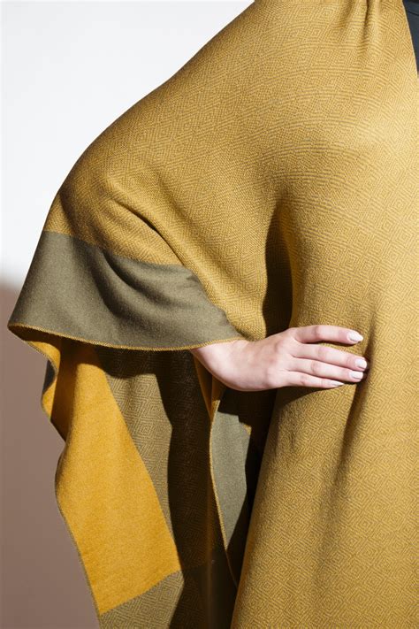 Serpentine Patterned Reversible Cape – Khaleej