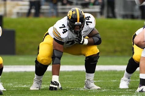 Download Football Lineman Ready Position Wallpaper | Wallpapers.com