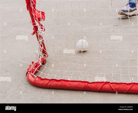 Floorball goal ready for training. Children playing outdoor in spring ...