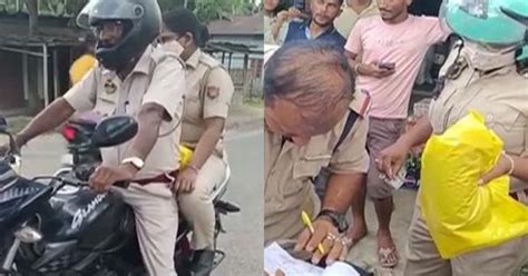 Video: Men on road intercept Assam police officer for riding pillion ...