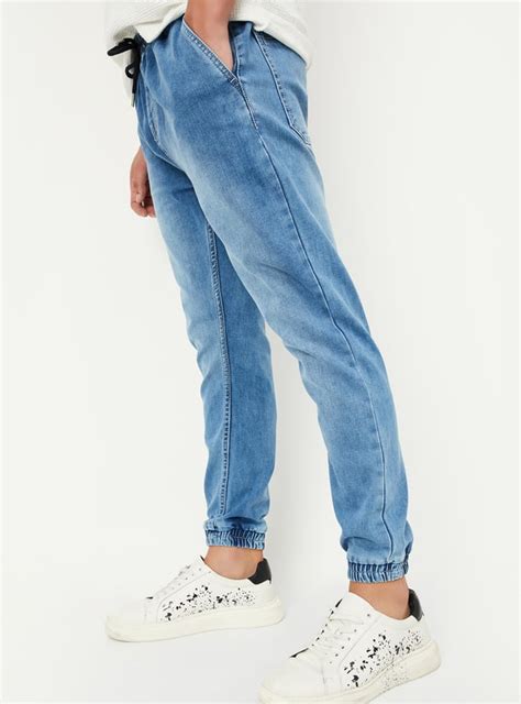 Buy Men Carrot Fit Washed Denim Joggers Online at just Rs. 1499.0 ...