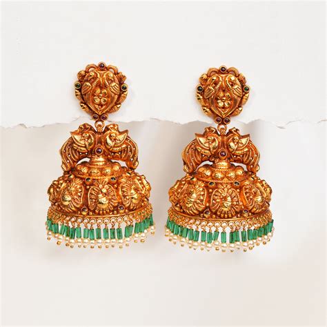 Heavy Temple Finish Silver Jhumkas with Floral and Peacock Detailing ...