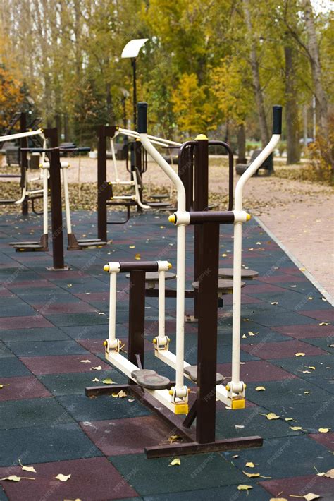 A playground with simulators on the shore in the park | Premium Photo