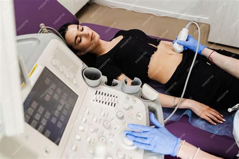 Premium Photo | Ultrasound of abdominal organs of girl for diagnosis of ...