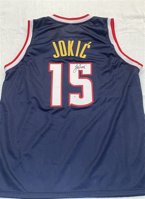 Nikola Jokic Signed Denver Nuggets Basketball Jersey with COA - Jerseys