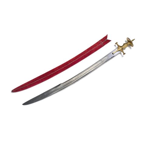 A sword (talwar) with watered steel blade and koftgari hilt, with ...