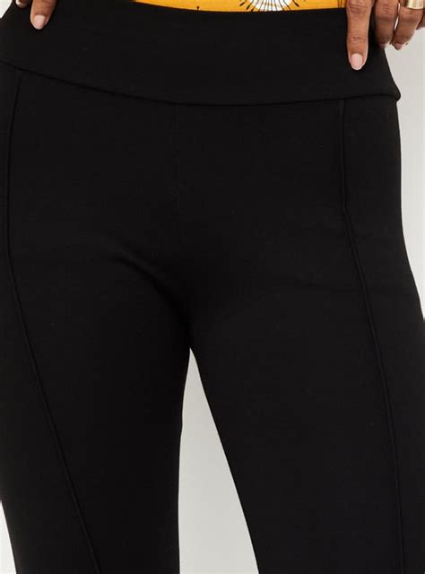 Buy Women Solid Stretch Knit Treggings Online at just Rs. 899.0 ...
