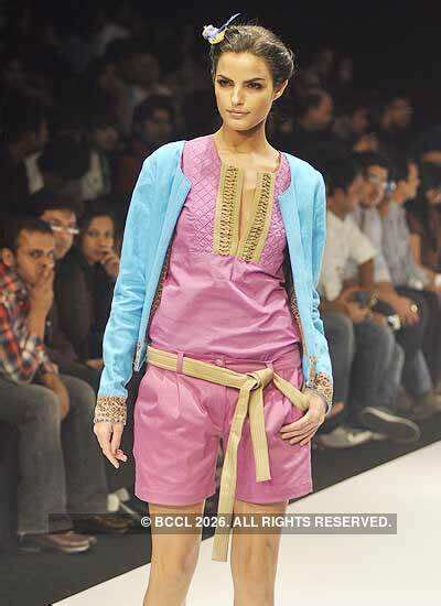 A model showcases a creation by designer VJ Balhara on Day 6 of the ...