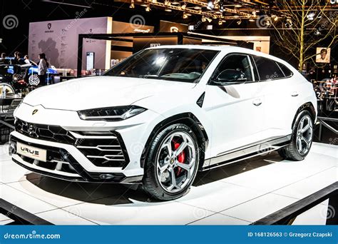 White Lamborghini Urus at Brussels Motor Show, SUV Manufactured by Italian Car Manufacturer ...