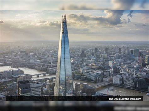Daredevil jumps off London's tallest building with parachute