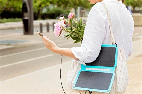 Solar battery charger for mobile devices sustainable lifistyle idea ...