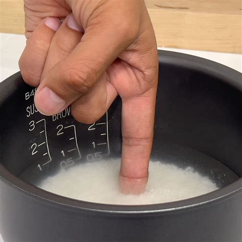 How To Cook Rice Using Finger