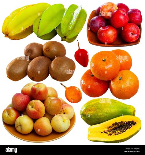 Many different types of fruits over white background Stock Photo - Alamy