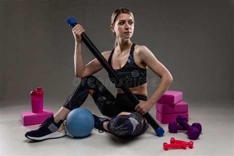 Girl in sports set slowly undresses and sits on the dick