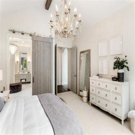 Classic Master Bedroom Design with White Walls and Chandelier