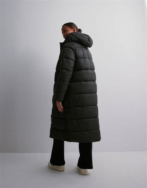 Köp Only ONLCAMMIE LONG QUILTED COAT CC OTW - Black | Nelly.com