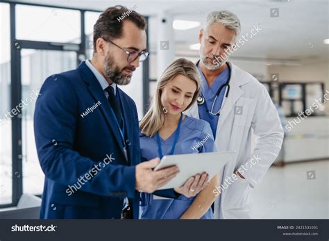 Pharmaceutical Sales Representative Talking Doctors Medical Stock Photo 2421531031 | Shutterstock