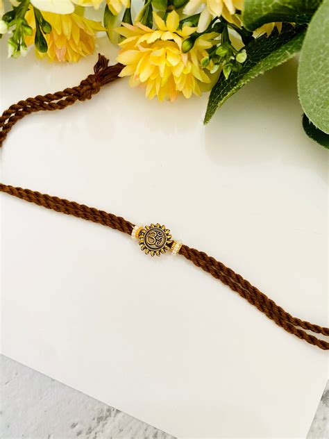 Sun om hand made bhai rakhi – Madhurya Rakhi