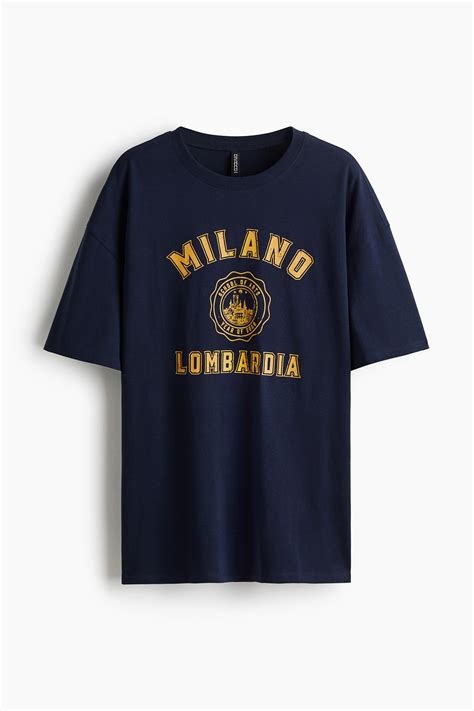 Oversized printed T-shirt - Navy blue/Milano - Ladies | H&M IN