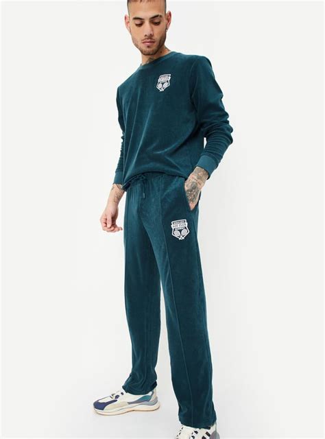 Buy Men Terry Sports Track Pants Online at just Rs. 999.0 ...