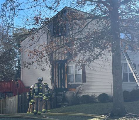 Four displaced after mysterious trash can fire extends to house