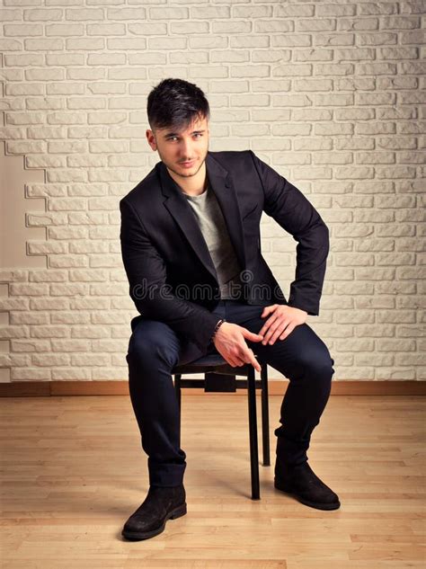 Suit Man Sitting 的图像结果