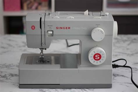 Image result for Self Threading Sewing Machine