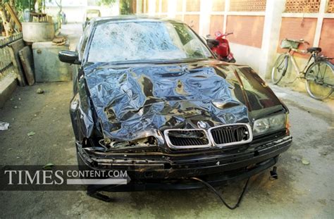Sanjeev Nanda News Photo The damaged BMW car that was d...