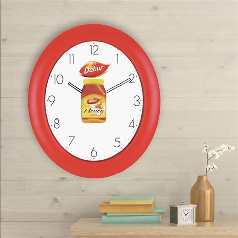 Dabur Honey - Oval Promotional Wall Clock with Revolving Logo - 14 inc ...