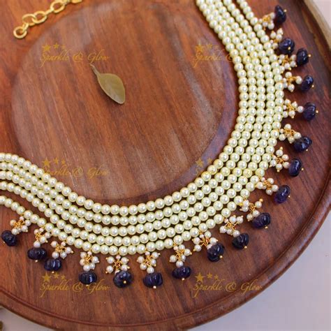 Elegant Five-Layer Pearl Choker with Blue Beads – Sparkle and Glow