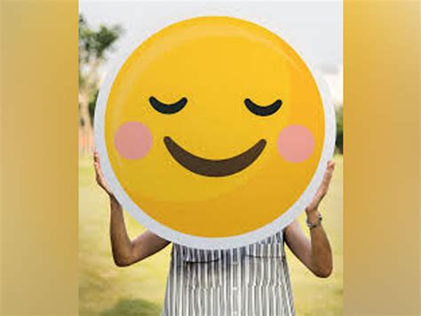 Science behind Happiness and the evolution of brain size