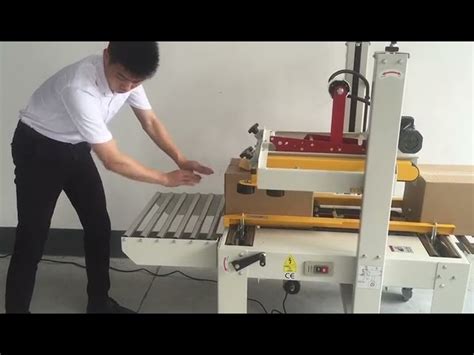 carton taping machine - Double Column Flaps Folding Carton Sealer ...