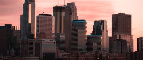 Download wallpaper 2560x1080 buildings, city, aerial view, sunset, dusk ...