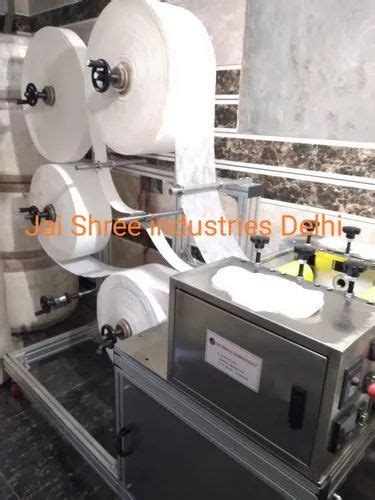 Sanitary Napkin Making Machine - Semi Automatic Sanitary Pad Machinery ...