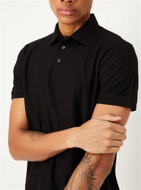 Buy Men Slim Fit Textured Polo T-shirt Online at just Rs. 699.0 ...