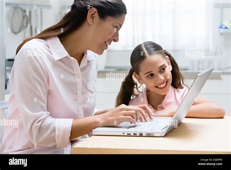 Daughter Using Computer 的图像结果