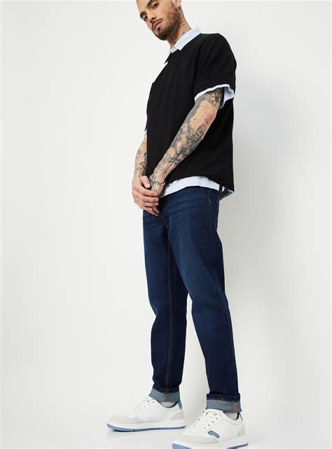 Buy Men Washed Carrot Fit Jeans Online at just Rs. 999.0 ...